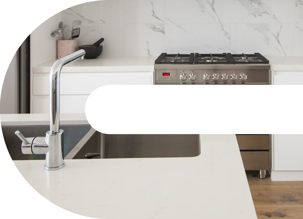 Kitchen with a tap and sink and oven
