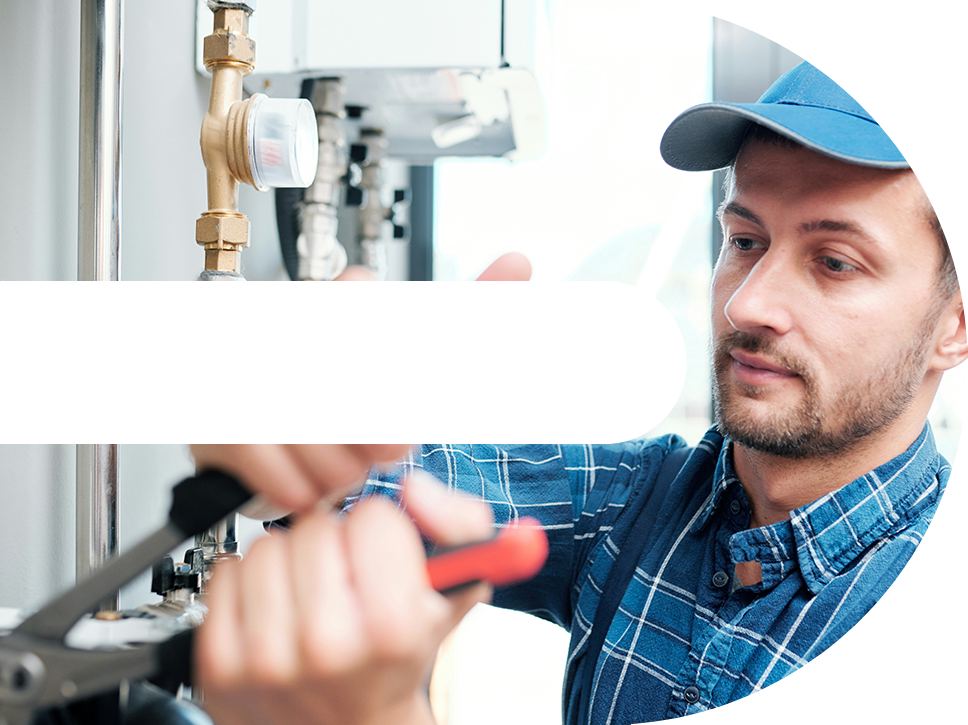 Mechanic working on pipes